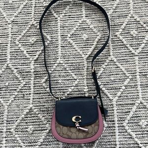 Small Coach crossbody navy blue, light pink, tan. Barley used.